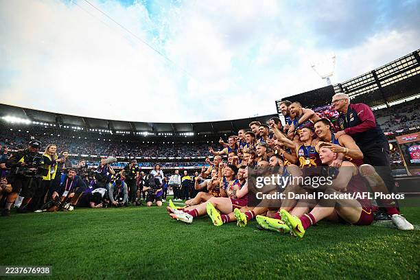 The Lions pose with the Premiership Cup after winning the AFL Grand Final match between Geelong Cats and Brisbane Lions at Melbourne Cricket Ground...