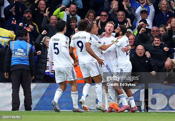 Sean Longstaff of Leeds United celebrates scoring his team's second goal with teammates during the Premier League match between Leeds United and...