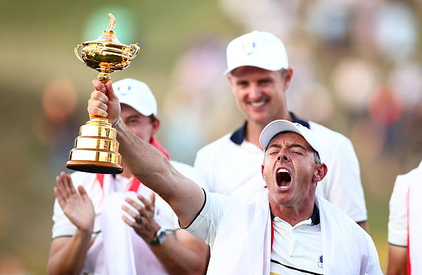New York , United States - 28 September 2025; Rory McIlroy of Team Europe lifts the Ryder Cup on day three of the 2025 Ryder Cup at Black Course at...