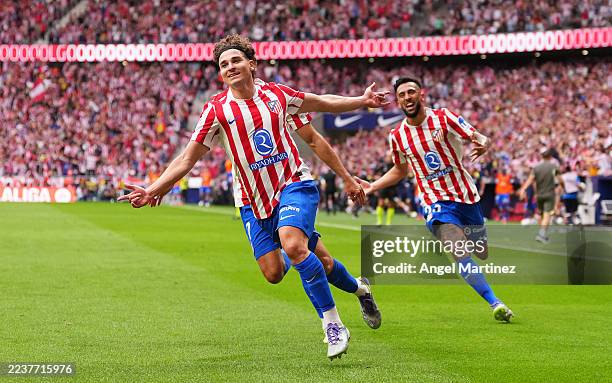Julian Alvarez of Atletico de Madrid celebrates scoring his team's fourth goal during the LaLiga EA Sports match between Atletico de Madrid and Real...