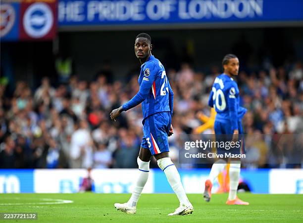 Trevoh Chalobah of Chelsea walks off after being shown a red card by Referee Simon Hooper during the Premier League match between Chelsea and...