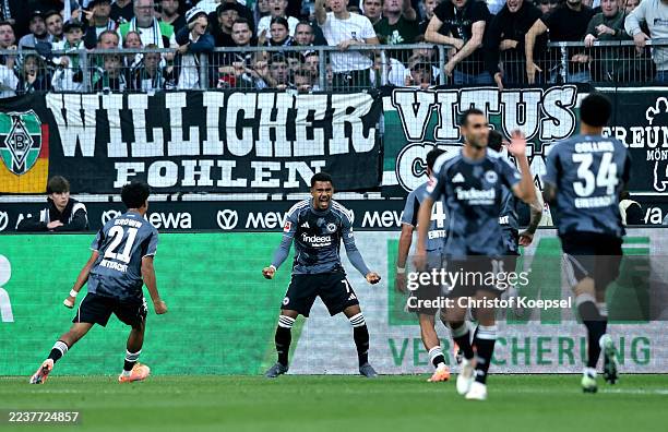Ansgar Knauff of Eintracht Frankfurt celebrates scoring his team's second goal during the Bundesliga match between Borussia Mönchengladbach and...