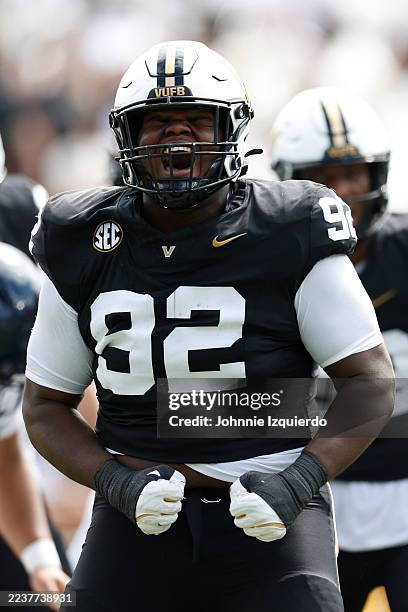 Jaylon Stone of the Vanderbilt Commodores celebrates after a sack during the first half of the game against the Utah State Aggies at FirstBank...