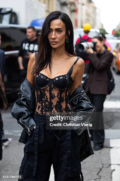 Silvia Braz wears black laced shirt, leather jacket outside Dolce & Gabbana during the Milan Fashion Week Womenswear Spring/Summer 2026 on September...