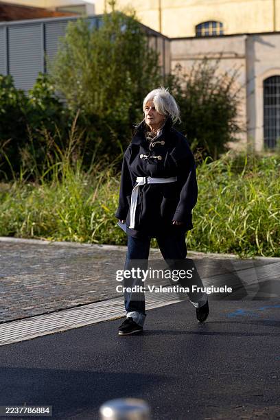 Sophie Fontanel wears a bleu jacket, blue jeans and black shoes outside Bottega Veneta show during the Milan Fashion Week Womenswear Spring/Summer...