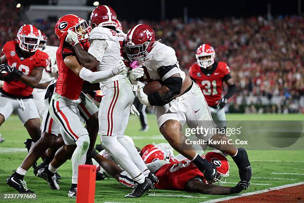 Kadyn Proctor of the Alabama Crimson Tide runs with the ball during the second quarter against the Georgia Bulldogs at Sanford Stadium on September...