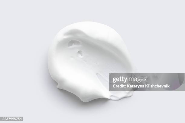 samples of cosmetic products, foam smear texture on a light background, skincare cosmetics concept - wearing cloth face mask stock pictures, royalty-free photos & images