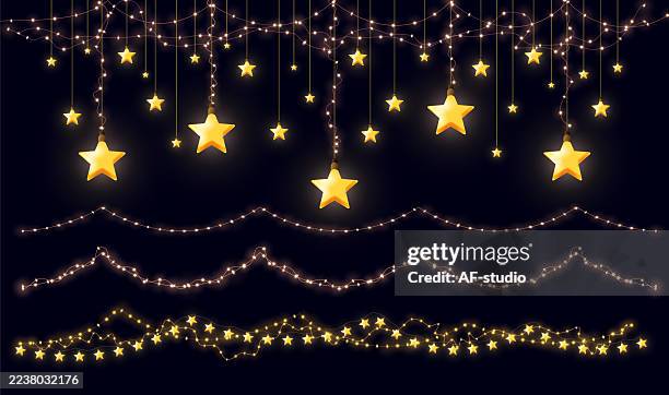 christmas tree lights garlands set - string lights transparent stock illustrations