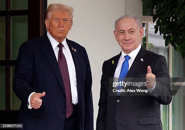 President Donald Trump greets Israeli Prime Minister Benjamin Netanyahu as he arrives at the White House on September 29, 2025 in Washington, DC. In...