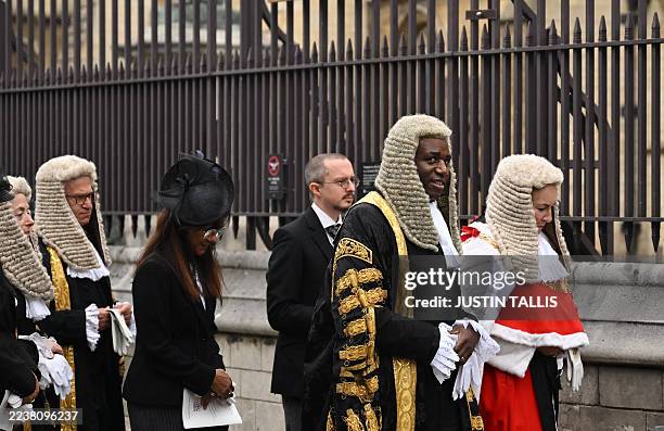 Britain's recently appointed Justice Secretary, and deputy Prime Minister, David Lammy walks with Lady Chief Justice of England and Wales, Sue Carr ,...
