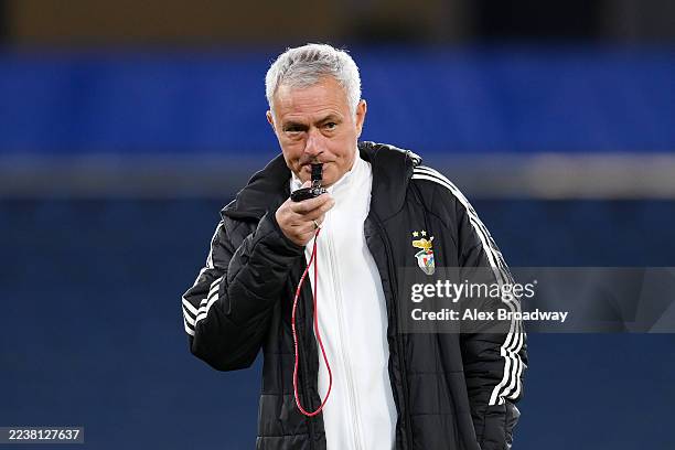 Jose Mourinho, Head Coach of SL Benfica, blows his whistle during a SL Benfica Training Session at Stamford Bridge on September 29, 2025 in London,...