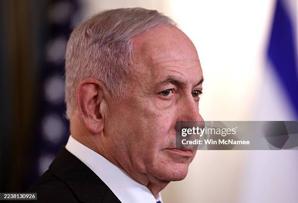 Israeli Prime Minister Benjamin Netanyahu participates in a joint news conference with U.S. President Donald Trump in the State Dining Room at the...