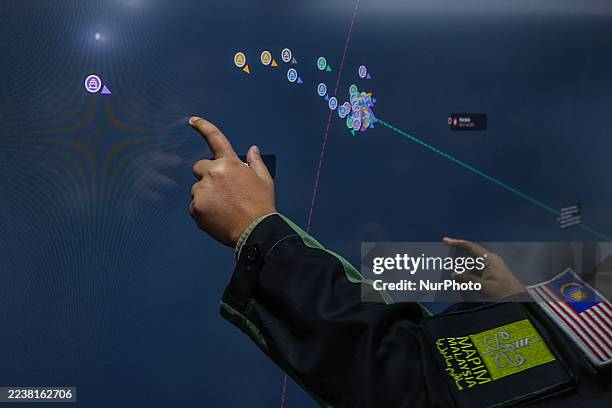 Monitor shows a live update of these vessels in Sepang, Malaysia, on October 1, 2025. The Global Sumud Flotilla mission carries humanitarian supplies...