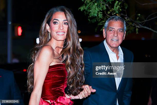 Amal Clooney and George Clooney attend the "Jay Kelly" red carpet during 63rd New York Film Festival at Alice Tully Hall, Lincoln Center on September...