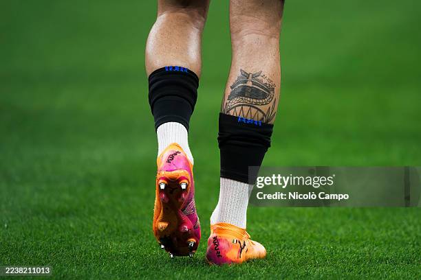 Detail shot of Alessandro Bastoni of FC Internazionale shows a tattoo on the calf depicting the stadio Giuseppe Meazza and the date May 23, 2021...