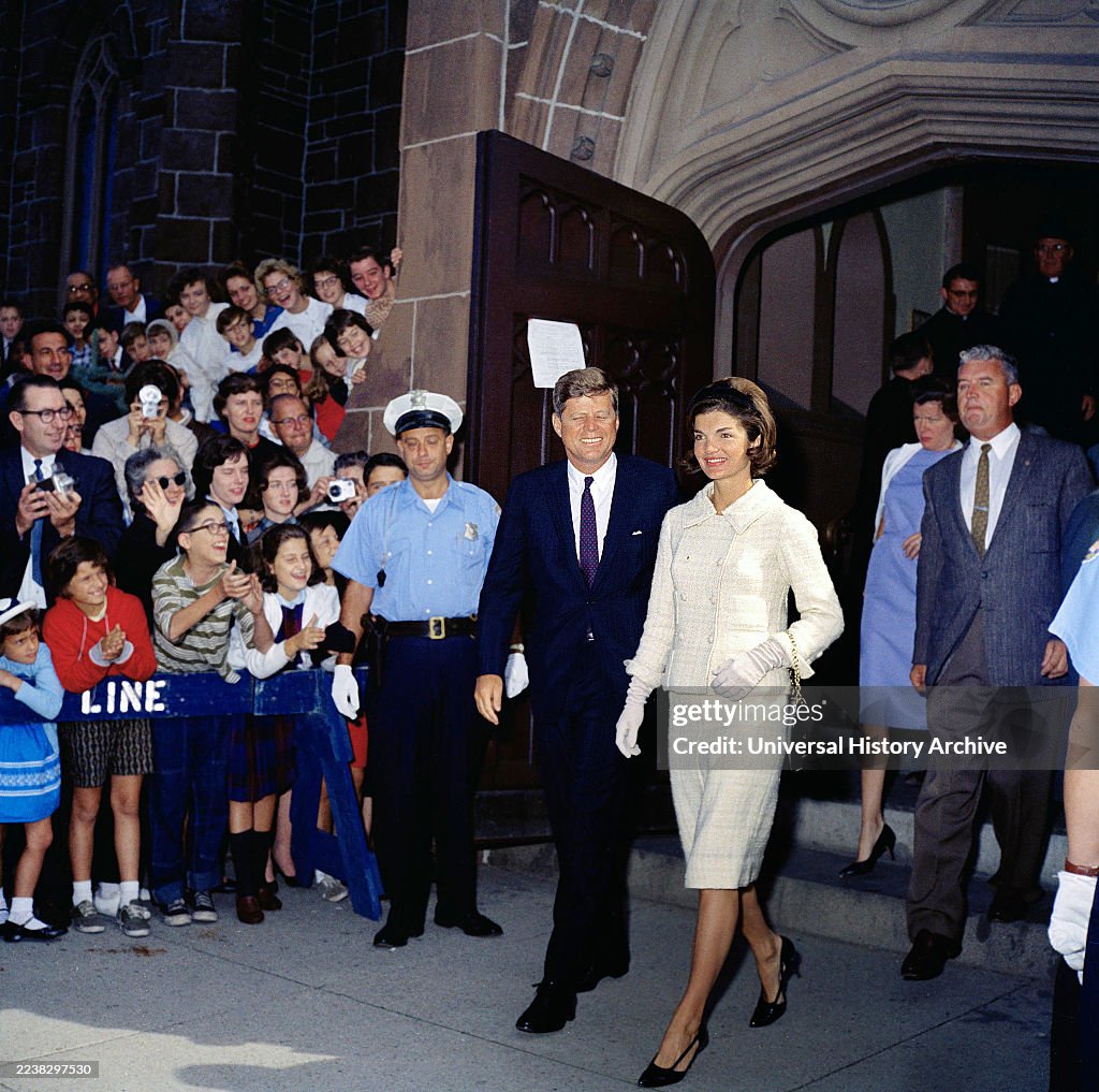 U.S. President John F. Kennedy and First Lady Jacqueline Kennedy leaving St. Mary's church after attending Mass, Newport, Rhode Island, USA, Robert Knudsen, White House Photographs, October 1, 1961