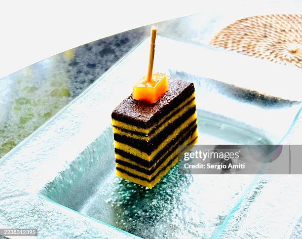 kue lapis legit cube - chocolate cube stock pictures, royalty-free photos & images