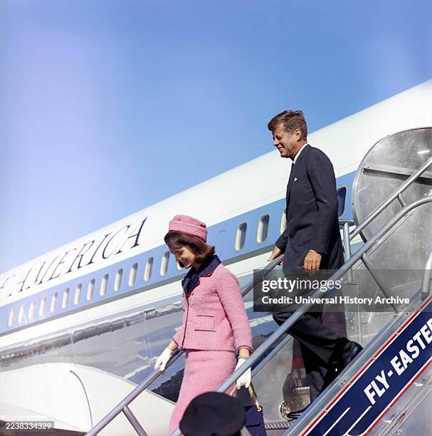 President John F. Kennedy and U.S. First Lady Jacqueline Kennedy descending stairs from Air Force One, Love Field, Dallas, Texas, USA, Cecil...