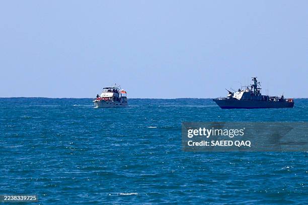 Boat from the Global Sumud Flotilla intercepted by Israeli forces in the Mediterranean sea off the Gaza Strip waters, is escorted towards the...