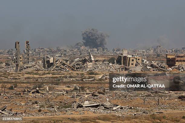 Smoke billows following an Israeli strike in Gaza City, on October 2 as pictured from Nuseirat in central Gaza, amid the ongoing conflict between...
