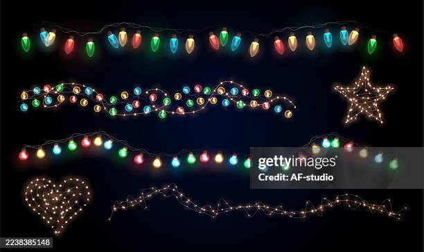 christmas tree lights garlands set - light bulb frame stock illustrations