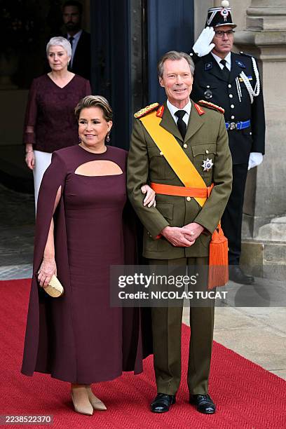 Luxembourg's Grand Duke Henri arrives with Grand Duchess Maria Teresa for his abdication ceremony at the Grand Ducal Palace in Luxembourg city on...