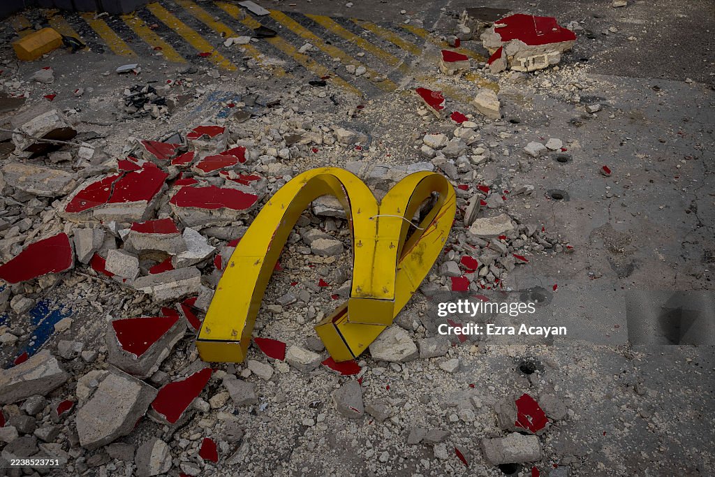 The signage of a collapsed McDonalds restaurant is seen on October ...