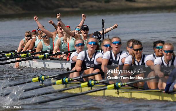 Cambridge celebrate crossing the finishing line to win the race during the 79th Oxford University v Cambridge University Women's Boat Race on the...