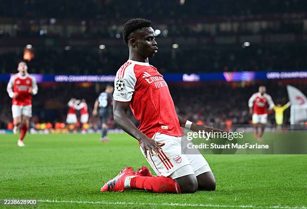 Bukayo Saka of Arsenal celebrates scoring his team's second goal during the UEFA Champions League 2025/26 League Phase MD2 match between Arsenal FC...