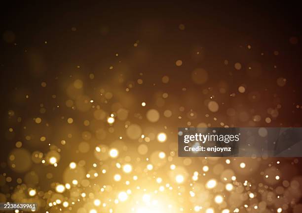 golden blurred christmas light background design - golden wedding card background stock illustrations