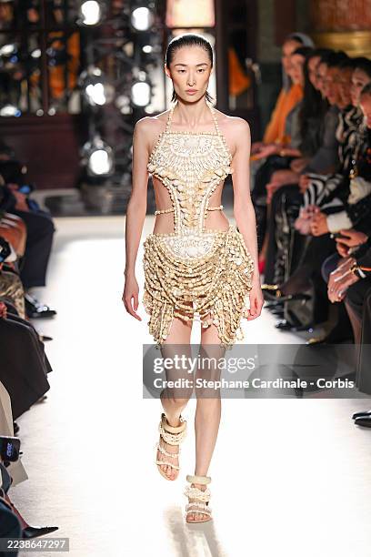 Chu Wong walks the runway during the Balmain Womenswear Spring/Summer 2026 show as part of Paris Fashion Week on October 01, 2025 in Paris, France.