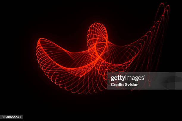 red laser light luminous spirograph pattern—a complex web of perfect geometric curves and loops, and post retouched. - laser pointer stock pictures, royalty-free photos & images
