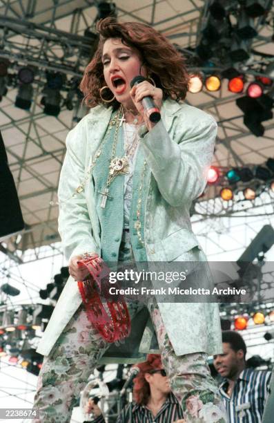Madonna performs for a sold out crowd at the Live Aid concert at JFK Stadium in Philadelphia, Pennsylvania, July 13, 1985. Photo by Frank...