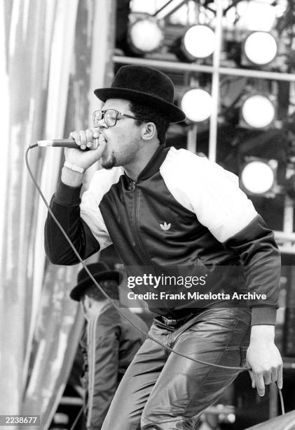 Of "Run DMC" performs for a sold out crowd at the Live Aid concert at JFK Stadium in Philadelphia, Pennsylvania, July 13, 1985. Photo by Frank...