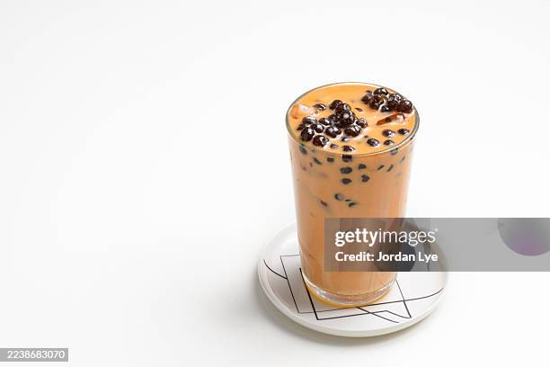 bubble milk tea on white background - bubble tea stock pictures, royalty-free photos & images