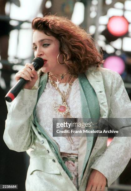 Madonna performs for a sold out crowd at the Live Aid concert at JFK Stadium in Philadelphia, Pennsylvania, July 13, 1985. Photo by Frank...