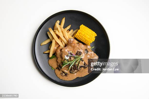 black pepper sauce chicken chop - grilled corn isolated stock pictures, royalty-free photos & images