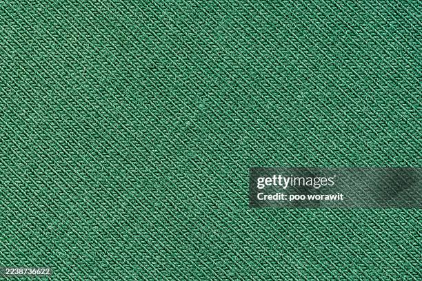 green fabric background. - polyester stock pictures, royalty-free photos & images