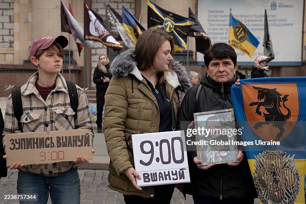 Relatives of fallen soldiers during the minute of silence on October 1, 2025 in Kharkiv, Ukraine. Minute of silence held at Freedom Square to honor...