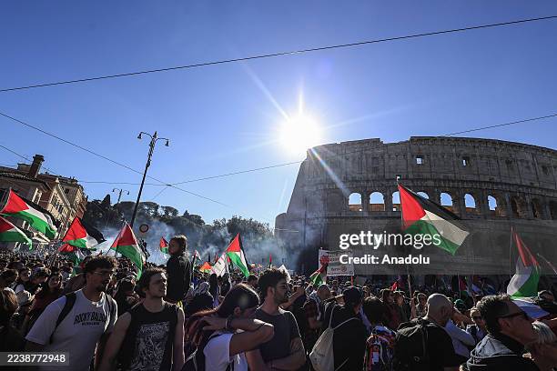 Protesters make their way past the Colosseum during a national demonstration in support of Palestine in Rome, Italy, on October 04, 2025.
