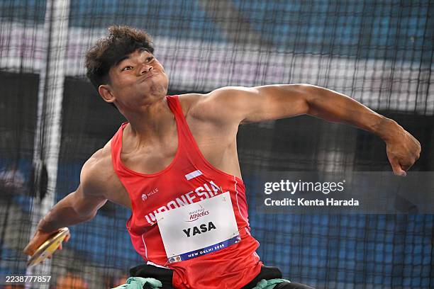 Kadek Dwi Yasa of Team Indonesia competes in the Men's Discus Throw - F57 Final during day six of the World Para Athletics Championships New Delhi...