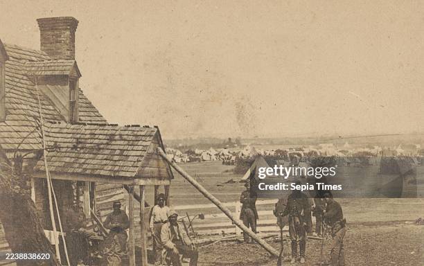 Headquarters Lafayette, headquarters Gen'l Porter, Farnhold's house and York River in the distance, Photograph shows Union soldiers at headquarters...