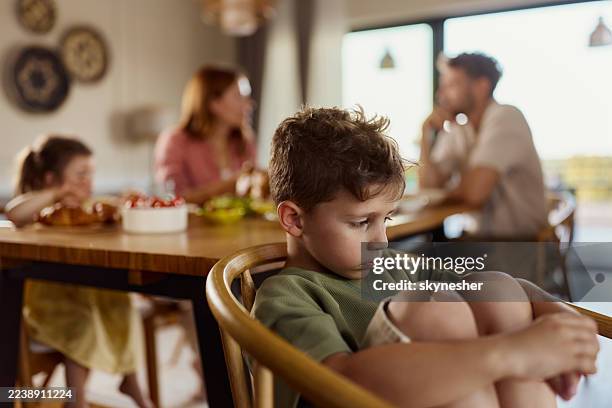 i don't want to eat with my family! - sulking stock pictures, royalty-free photos & images