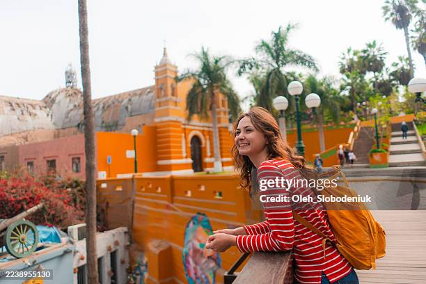woman exploring architecture in culture in lima, peru - lima peru stock pictures, royalty-free photos & images