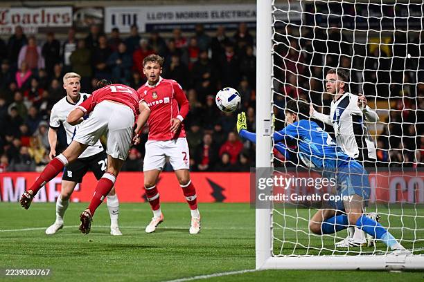 George Dobson of Wrexham scores his team's first goal during the Sky Bet Championship match between Wrexham AFC and Birmingham City at Racecourse...