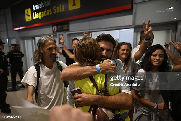 Activists from the Global Sumud Flotilla, detained by Israel after it attacked the Flotilla, arrive in Madrid from Tel Aviv on a scheduled Air Europa...