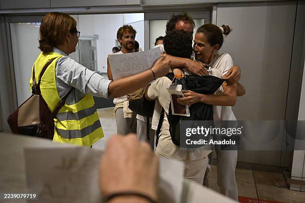 Activists from the Global Sumud Flotilla, detained by Israel after it attacked the Flotilla, arrive in Madrid from Tel Aviv on a scheduled Air Europa...