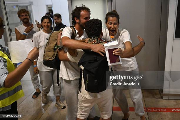 Activists from the Global Sumud Flotilla, detained by Israel after it attacked the Flotilla, arrive in Madrid from Tel Aviv on a scheduled Air Europa...
