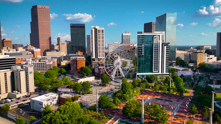 https://media.gettyimages.com/id/2239266767/video/atlanta-city-skyline-at-sunset-with-highways-and-modern-downtown-buildings.jpg?b=1&s=640x640&k=20&c=bPwAQbSqGoTF0SpO-LiM4aglOqRSxEMlmkJoj2GNAj4=