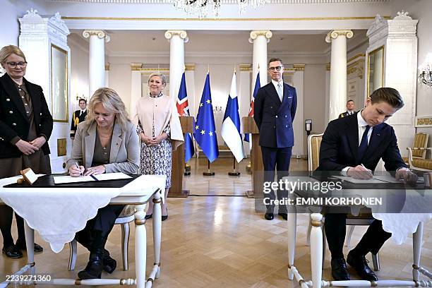 Icelandic Foreign Minister Thorgerdur Katrin Gunnarsdottir and Finnish Defence Minister Antti Häkkänen sign a bilateral defence cooperation agreement...
